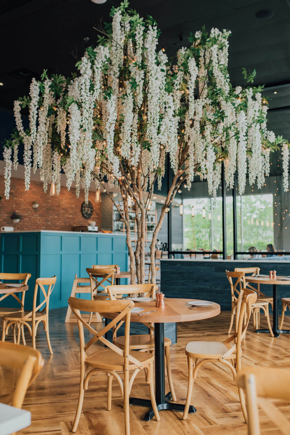 Artificial Wisteria Tree amongst tables and chairs in New Jersey Restaurant