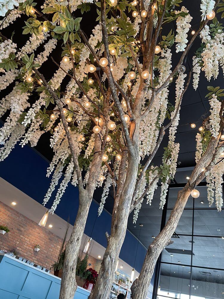 Low angle close up view of lighted Artificial Wisteria Tree in New Jersey Restaurant