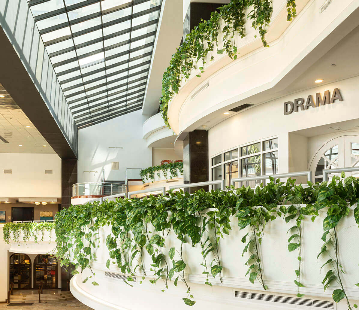 Replica ivy adorn upper level walkways at Datran Business Center