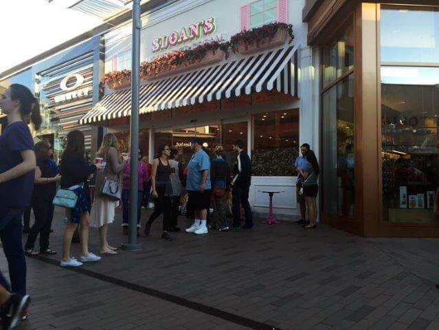 People in line outside of Sloan's Ice Cream parlor restaurant