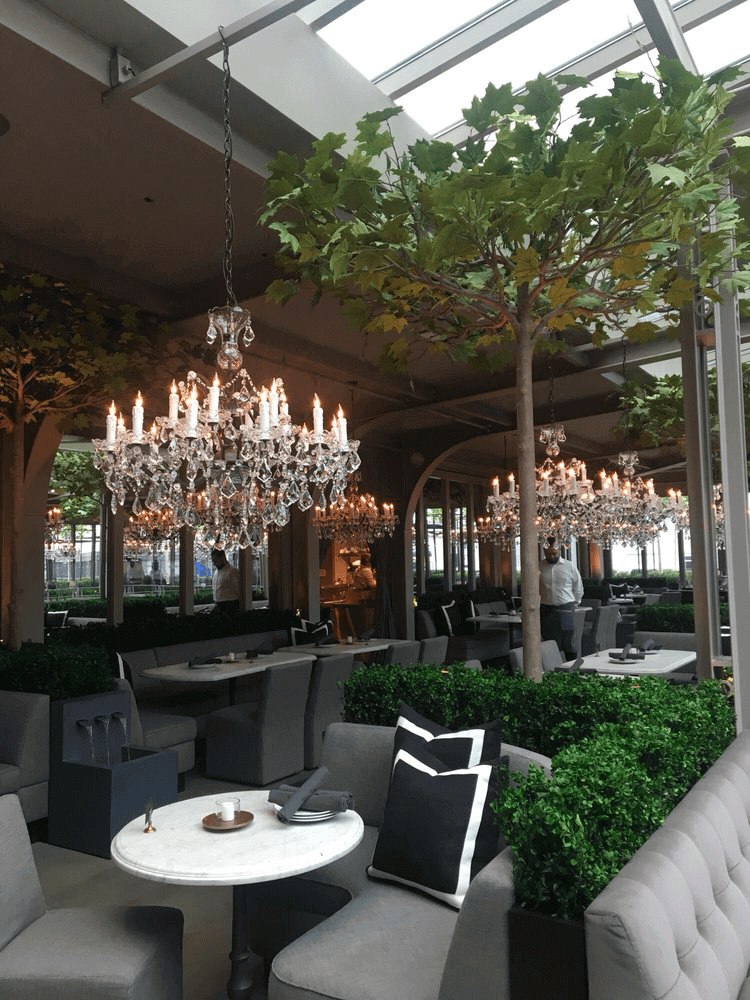 Fabricated London Planetrees and Preserved Boxwood Hedges enhance booths at RH Restaurant New York