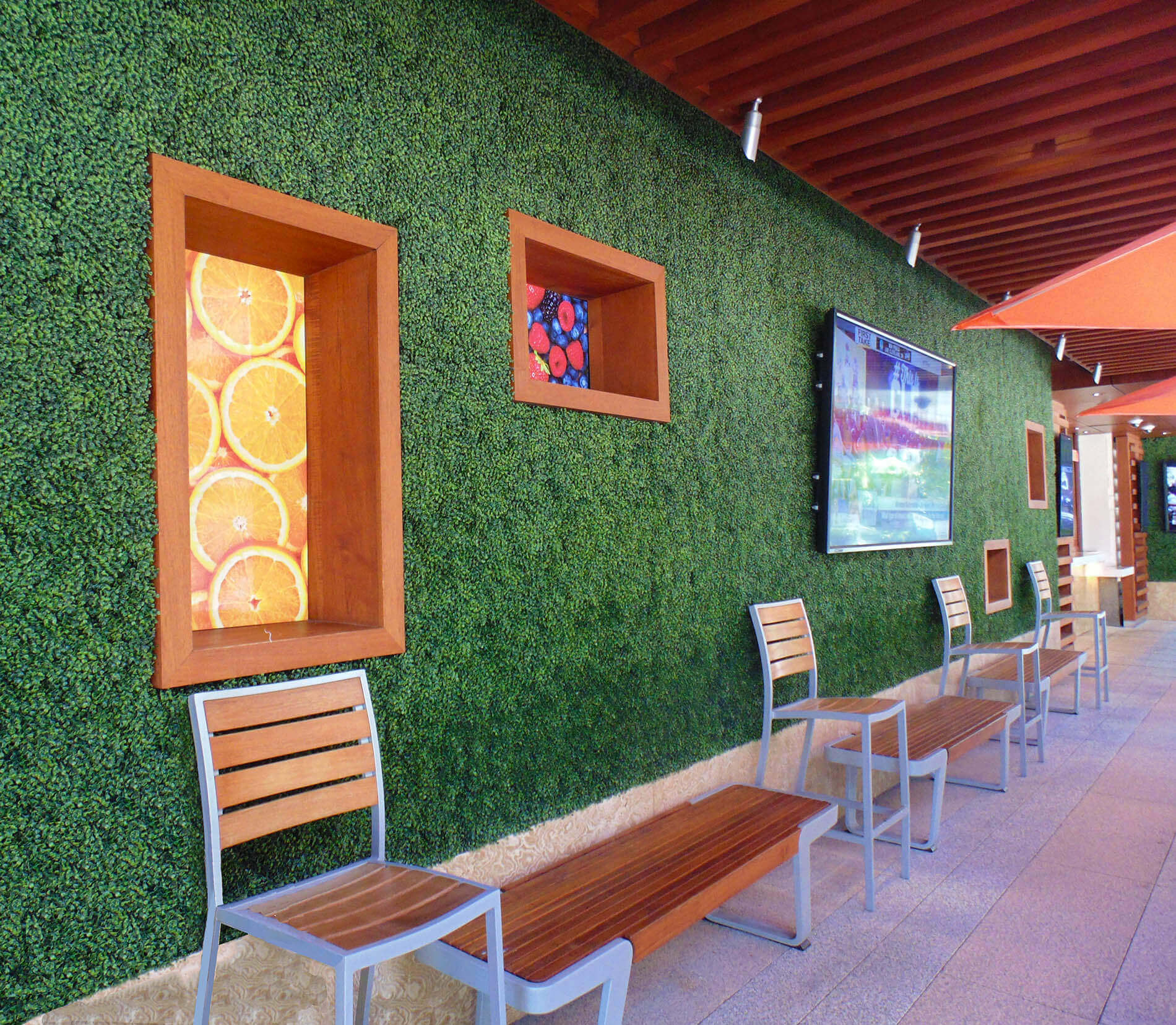 Artificial green walls at Squeeze juice bar