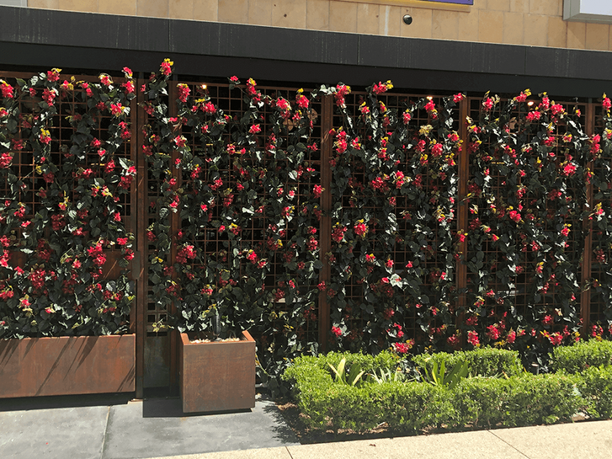 Shaquilles Restaurant Los Angeles outdoor Fabricated Bougainvillea Flower Green Wall