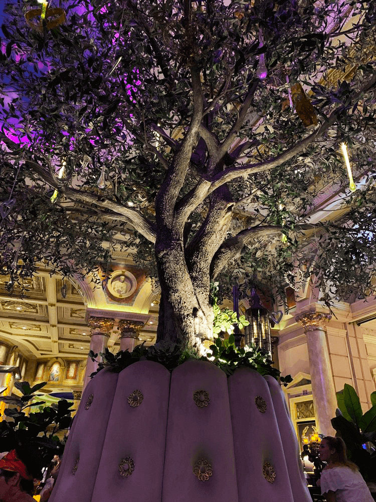 Low angle view of replica olive tree at Vanderpump Cocktail Garden