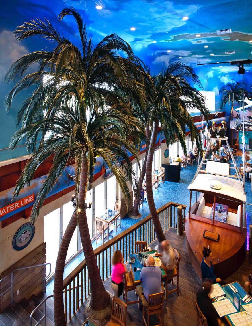 High angle view showing prop boat & Fabricated Coconut Palm Trees at Margaritaville Restaurant, Las Vegas