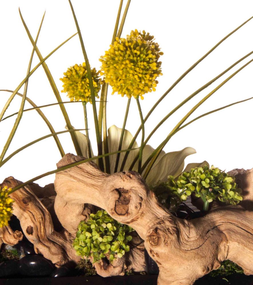 Natural driftwood replica floral arrangement close up