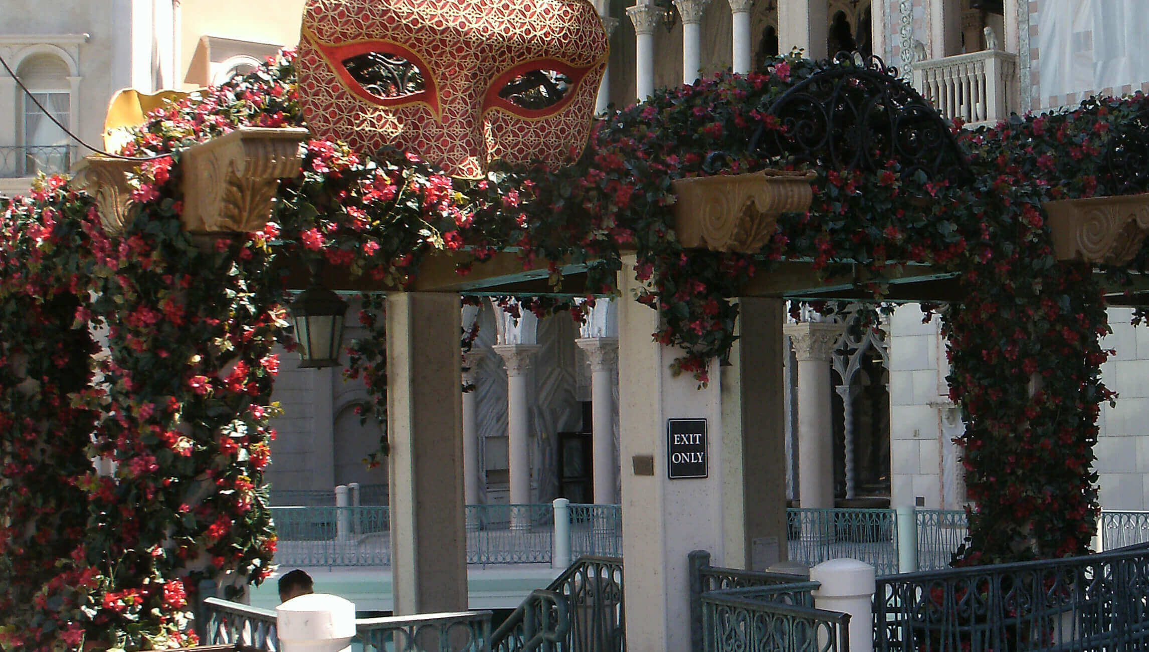 Bougainvilleas grace the columns and the top of a trellis at the gondola gateway in the Venetian Hotel & Casino