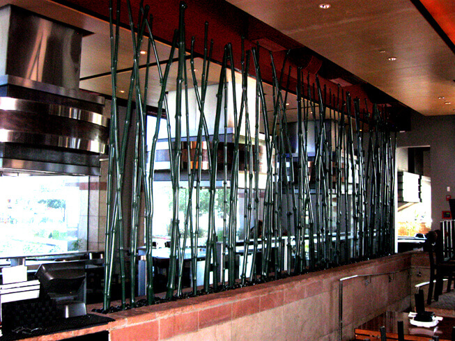 Natural bamboo poles used as divider at Sapporo Restaurant