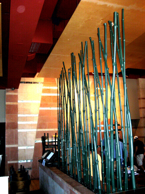 Natural bamboo poles serving as space divider at Sapporo Restaurant