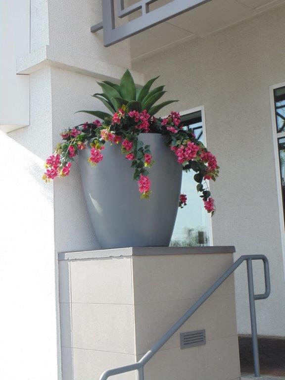 Artificial Flowers and Plant in Pot at the Ogden Condos