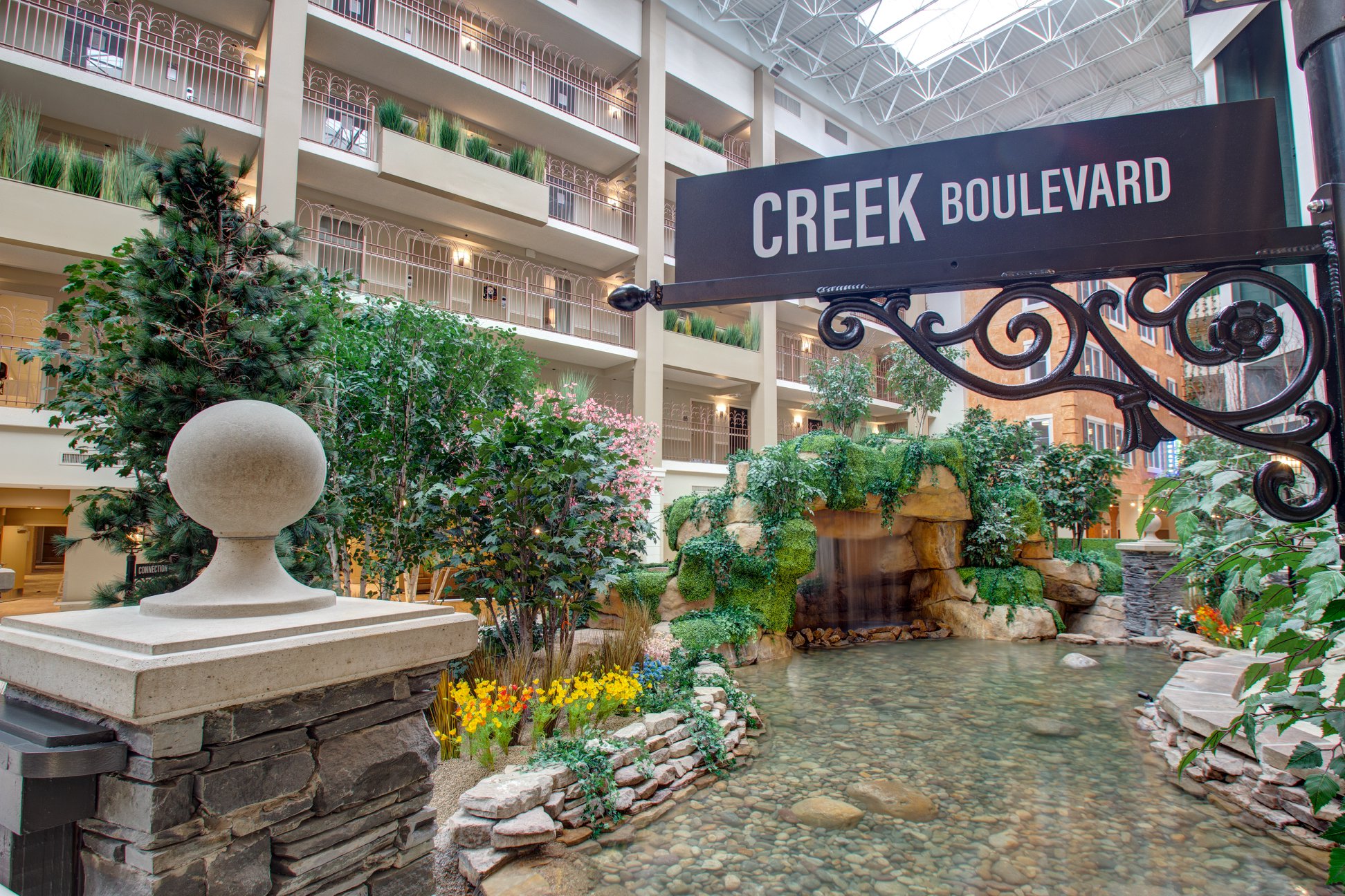 Atrium, Fountain, and Landscaping at Living Community