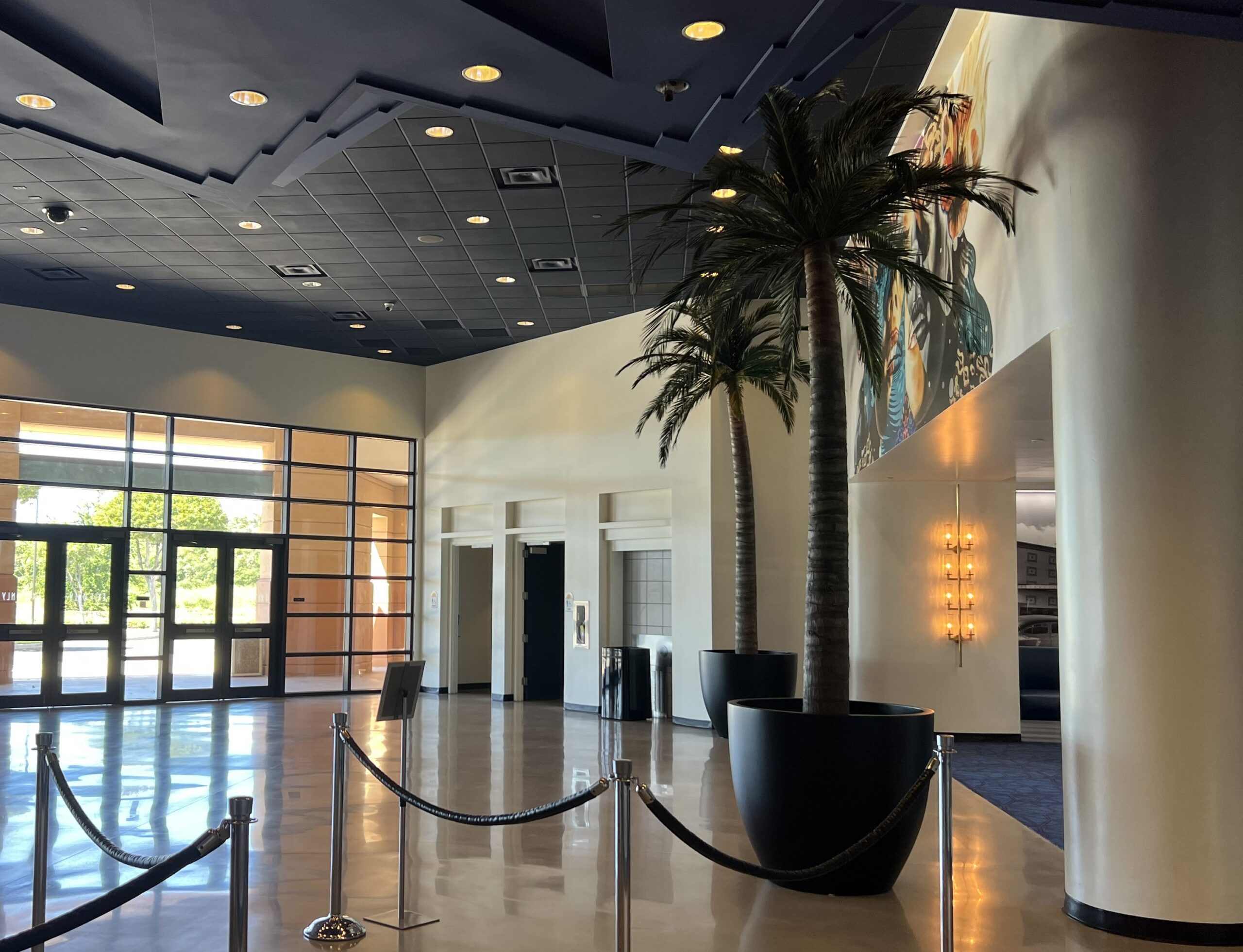 Consolidated Theatres Kapolei Palm Trees lobby entrance view